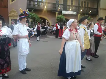 Folklore dancing in the evening at Colmar, Alsace (France)